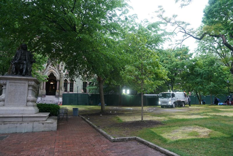 Penn dismantles Gaza Solidarity Encampment on College Green, disposing of tents, flags, and signs